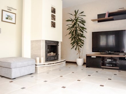 Salon z kominkiem Sento Home